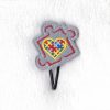 puzzle detail puzzle piece border puzzled heart middle embroidery design support autism awareness feltie